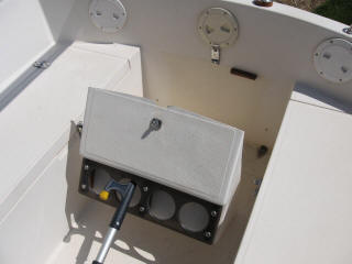 It rotates forward to open.