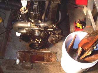 The bad wood is removed, leaving the original fiberglass sides.